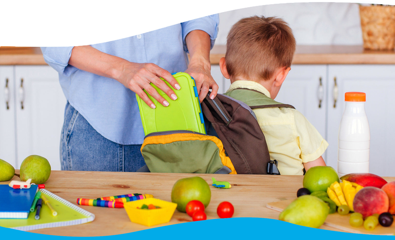Mom putting lunch in child's bag