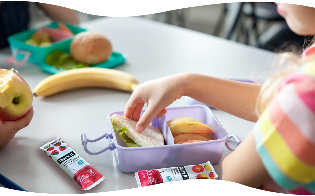 a school child eating her lunch and That's it. bars